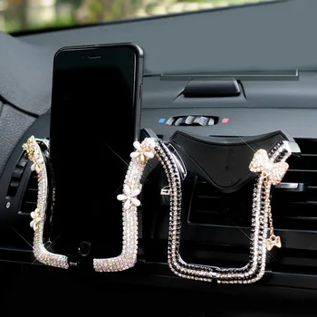 Оптовая продажа, Универсальный автомобильный держатель для телефона с бриллиантовым цветком и бантом, зажим для автомобильного вентиляционного отверстия со стразами, автомобильный держатель для iPhone